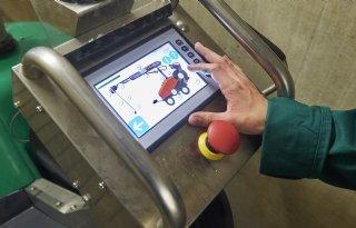 Spuitrobots+zijn+inmiddels+gewilde+medewerkers+op+varkensbedrijven
